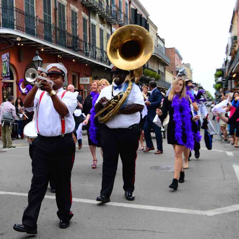 Musicians on a line through the French Quarter in New Orleans.